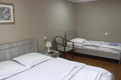 מיטה או מיטות בחדר ב-Apartment Erekle 6