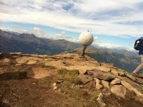 a person standing on top of a mountain at Parkhotel Post in Chiusa