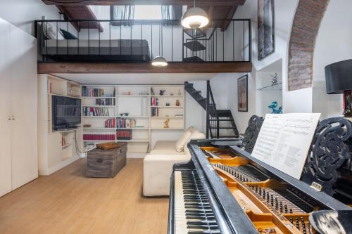 Vstupní hala nebo recepce v ubytování Musician Apartment Colosseo with Piano