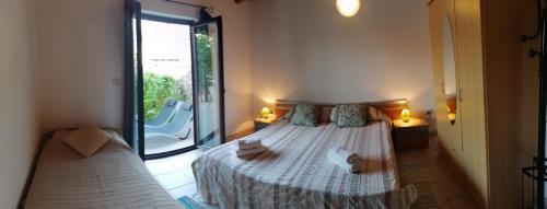 Krevet ili kreveti u jedinici u objektu Holiday apartment in Funtana with terrace, air conditioning, WiFi, washing machine 4982-6