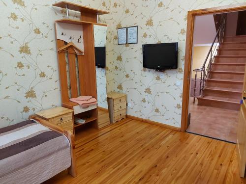 Postel nebo postele na pokoji v ubytování Готель "Монастирський"