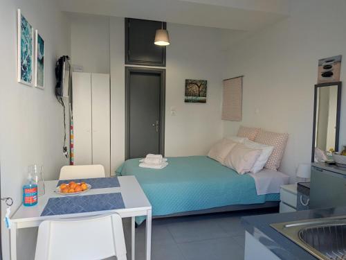 Postel nebo postele na pokoji v ubytování Finiki Seaside Apartment