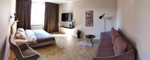 Et opholdsområde på Cosy Old Town Apartment