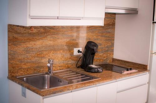 Køkken eller tekøkken på Beach Apartment 3