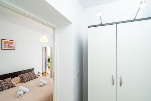 เตียงในห้องที่ Rooms Rose