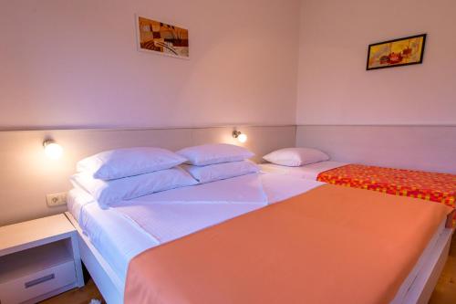 Katil atau katil-katil dalam bilik di APARTMANI IVAN I RUŽA