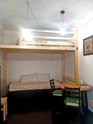Poschodová posteľ alebo postele v izbe v ubytovaní Casa Carmela
