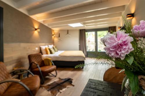 Postel nebo postele na pokoji v ubytování Guesthouse Het Gouden Eiland