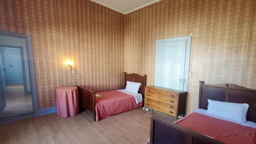 Hotel Do Parque, Boutique Hotel - Curiaにあるベッド