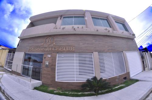 a round building with the words jordan refectory on it at Pousada Receptur in Piranhas