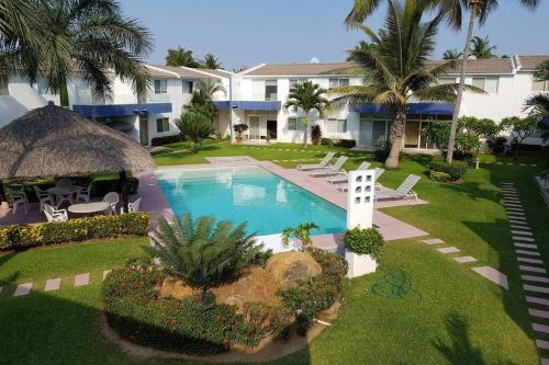 an aerial view of a resort with a swimming pool at Casa en Acapulco Diamante in Acapulco