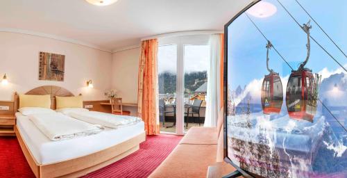 Postel nebo postele na pokoji v ubytování Hotel Montana