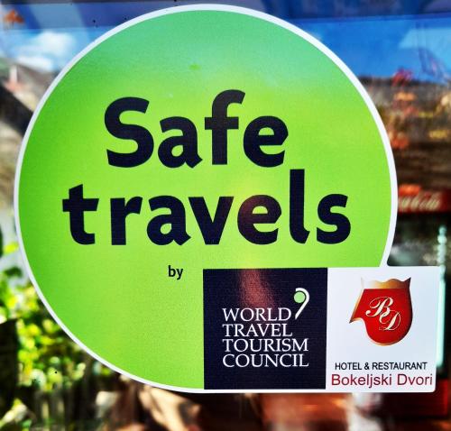 a sign for safe travels on a store display at Hotel Bokeljski Dvori in Kotor