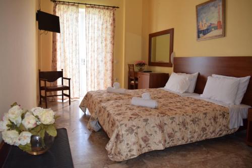 Postel nebo postele na pokoji v ubytování Sofia Hotel