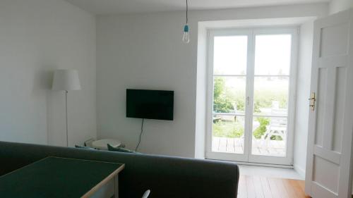 TV a/nebo společenská místnost v ubytování Haus Münsterblick