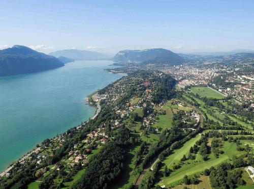 an aerial view of a city next to a body of water at Studio 329 in Aix-les-Bains