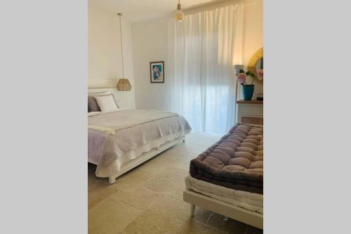 Postel nebo postele na pokoji v ubytování Mediterranean Spa Suite