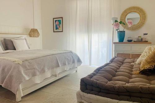 Ένα ή περισσότερα κρεβάτια σε δωμάτιο στο Mediterranean Spa Suite