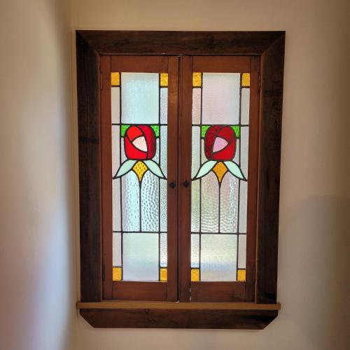 a stained glass window in a room at Loch Lomond Blair Byre in Rowardennan
