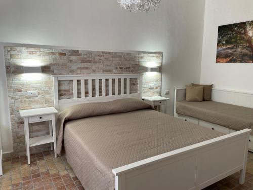 Ein Bett oder Betten in einem Zimmer der Unterkunft Sa Vivenda Suite
