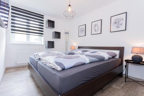 Postel nebo postele na pokoji v ubytování Ferienwohnung im Zentrum