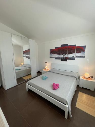 En eller flere senge i et værelse på Holiday Sa Marina