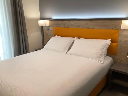 Katil atau katil-katil dalam bilik di Arvo Residence Sila Lorica