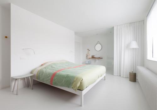 Кровать или кровати в номере Logieslogees