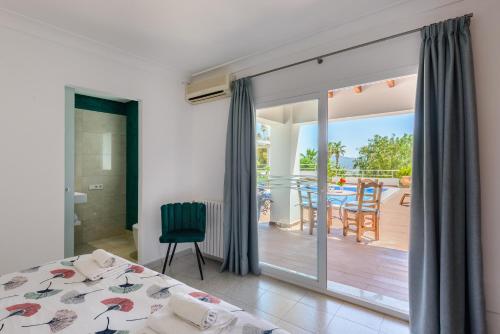 Ένα ή περισσότερα κρεβάτια σε δωμάτιο στο Villa Sa Rota Family