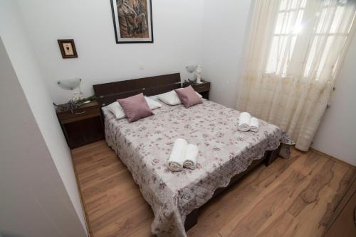 A bed or beds in a room at Apartment Alba