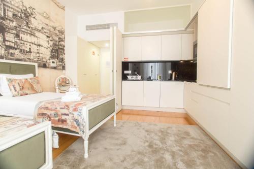 Η κουζίνα ή μικρή κουζίνα στο Aliados Downtown Studio by Porto City Hosts