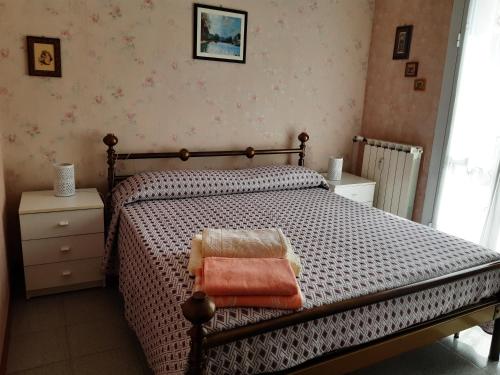 Voodi või voodid majutusasutuse Casa Vacanze Saviozzi - Diano M. toas