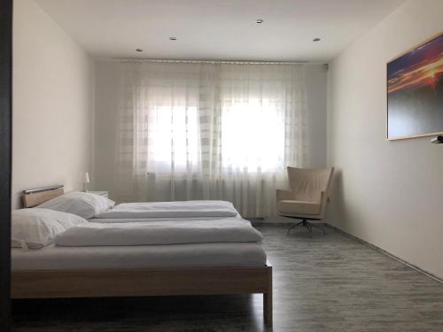 Postel nebo postele na pokoji v ubytování Apartmán Hrušky