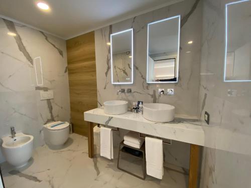 Koupelna v ubytování Hotel Croce Di Malta
