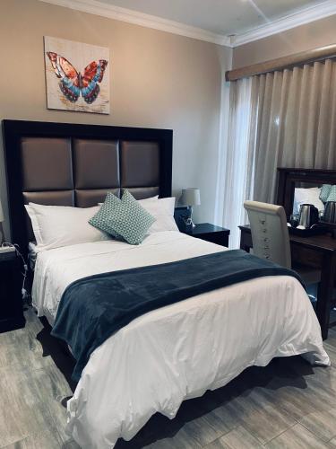 Una cama o camas en una habitación de RNB Guesthouse