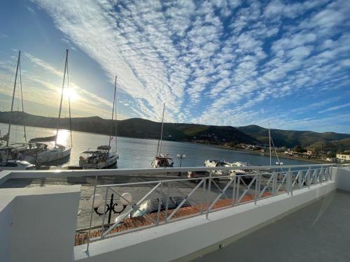 a view of a marina with boats in the water at AEGEAN VIEW SEASIDE ROOMS AND STUDIOS KEA in Korissia