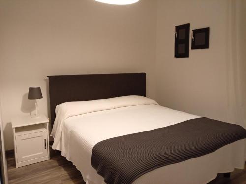 Postel nebo postele na pokoji v ubytování La Cjase di Pieri e Vilme