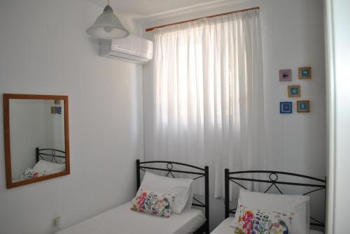 Postel nebo postele na pokoji v ubytování Ideal Home near the beach