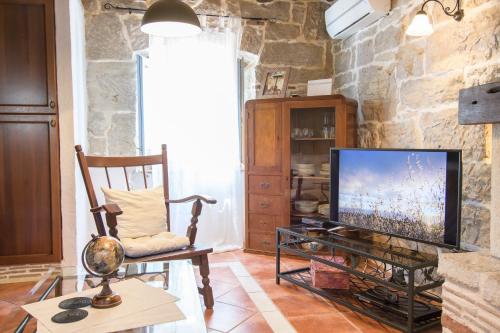 TV tai viihdekeskus majoituspaikassa Villa Stefani