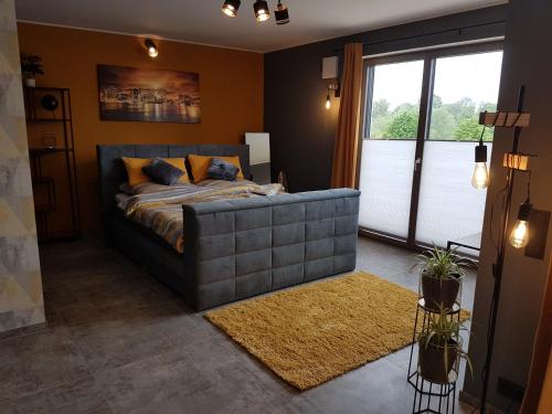 Ένα ή περισσότερα κρεβάτια σε δωμάτιο στο Timeout Lodges - Luxus für Zwei