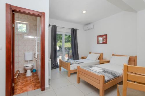 Postel nebo postele na pokoji v ubytování Guest house Vila Vedesa