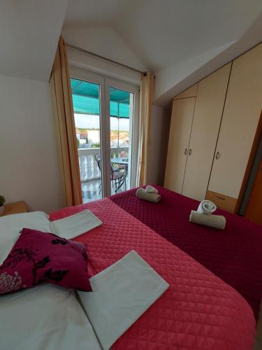 Un ou plusieurs lits dans un hébergement de l'établissement Guest House As
