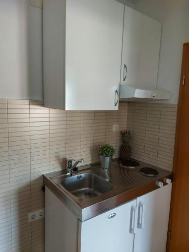 Cuisine ou kitchenette dans l'établissement Guest House As