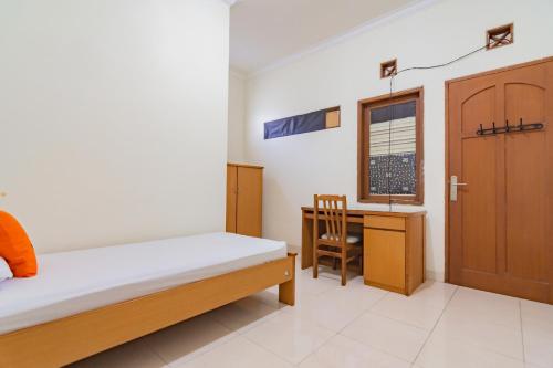 Ένα ή περισσότερα κρεβάτια σε δωμάτιο στο Koolkost near Riau Junction Mall (Minimum Stay 6 Nights)