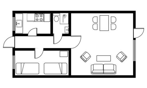 a black and white floor plan of a house at Pyttegården Apartments in Gudhjem
