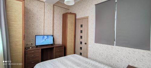 TV/trung tâm giải trí tại Apartments Vinogradnaya 188A