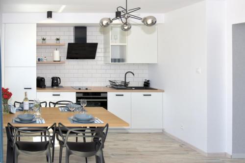 Kuchyň nebo kuchyňský kout v ubytování Domki Nord Star