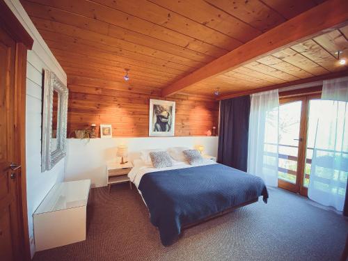 Postel nebo postele na pokoji v ubytování Nîdwazô - Ecolodge & Maison d'hôtes