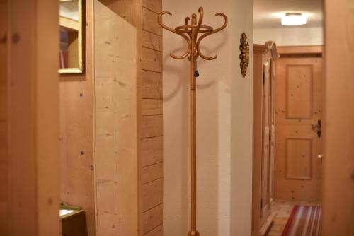 a pole in a hallway next to a door at Landhaus Huber in Elbigenalp