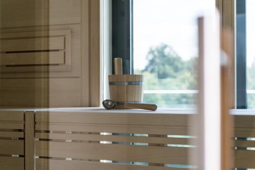 a window sill with a mortar and pestle on it at FREIgeist Göttingen Innenstadt, A Member of Design Hotels in Göttingen